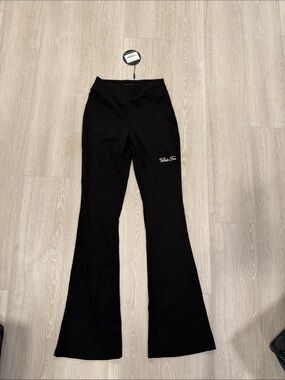 White Fox Boutique Jet Black Season 7 Flare Pants Tag medium